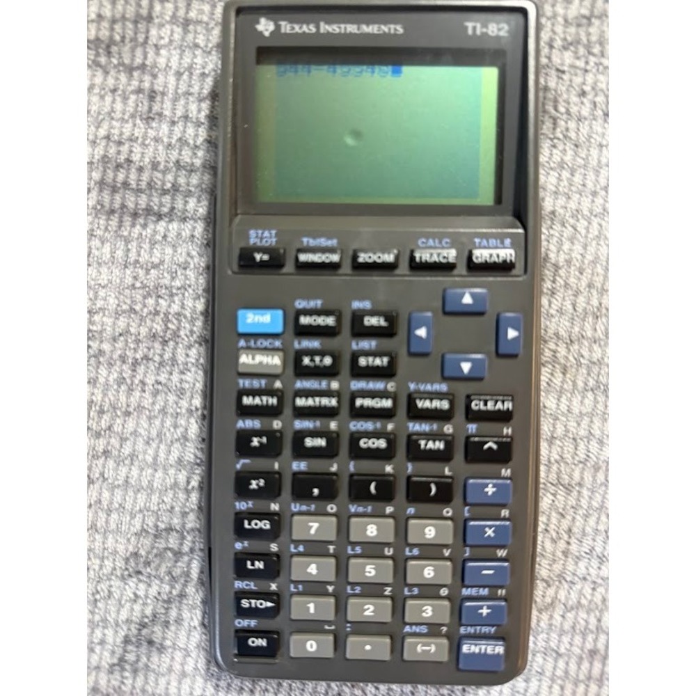 Texas Instruments TI-82 Graphing Calculator Gray Handheld Math Science TESTED.